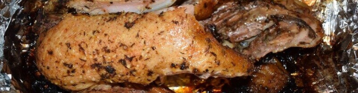 Canard rôti aux pommes et aux pruneaux